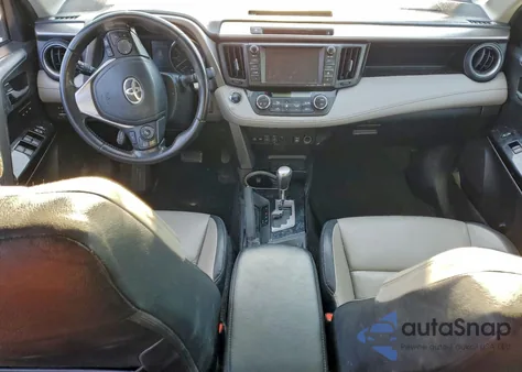 2016 Toyota Rav4 Limited z USA, uszkodzony, nr VIN JTMDFREV0GJ074323